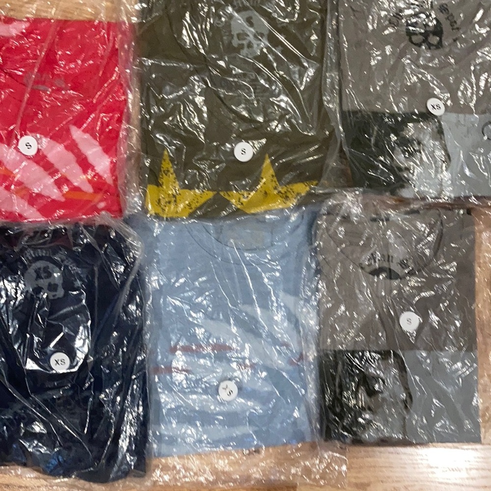 6 T-shirts  sizes S and XS from The Man Spot